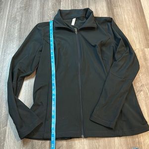 Under Armour black fitted zip up